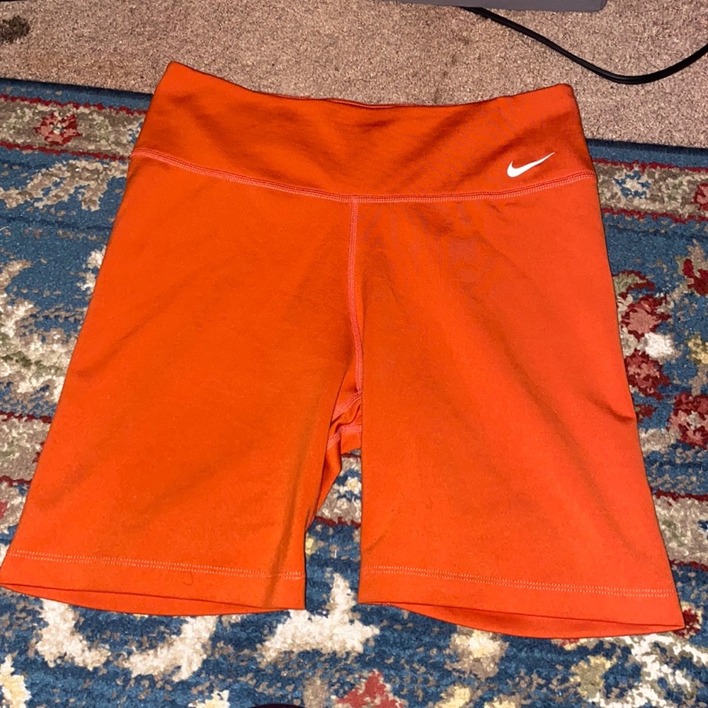 Orange Nike biker shorts
